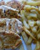 Filetes de pavo con patatas fritas