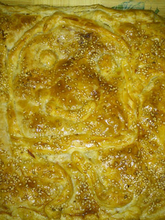 Foto principal de Empanada de queso, jamón y sésamo