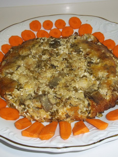 Una foto de Pastel de merluza, alcachofas y guisantes