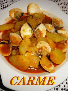 Una foto de Patatas caldosas con almejas