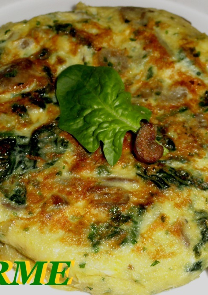 Una foto de Tortilla de espinacas y champiñones