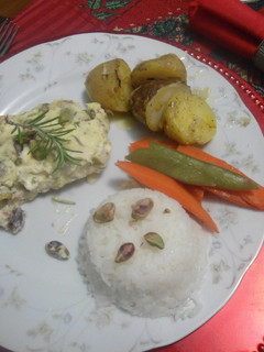 Una foto de Filete de salmón con pistachos y queso crema