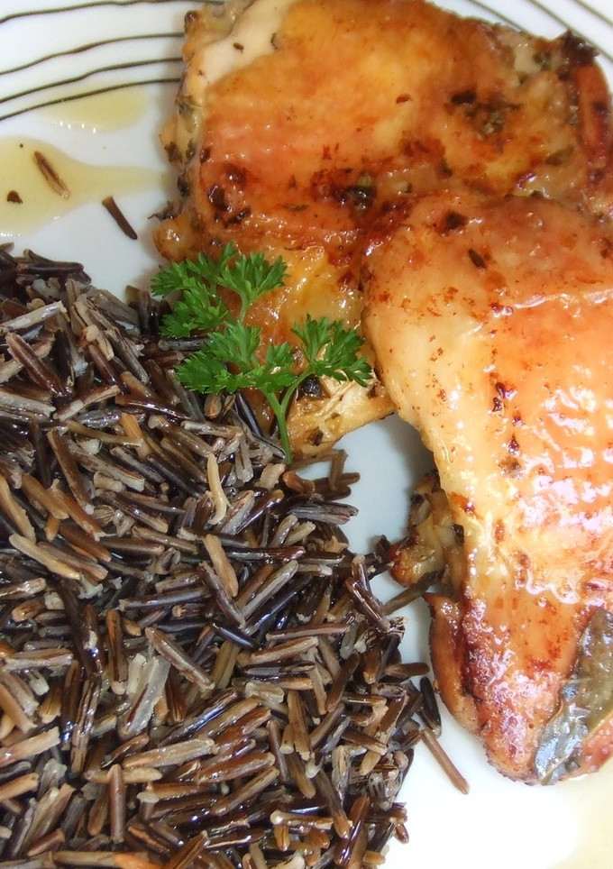 Una foto de Pollo asado con orégano y limón