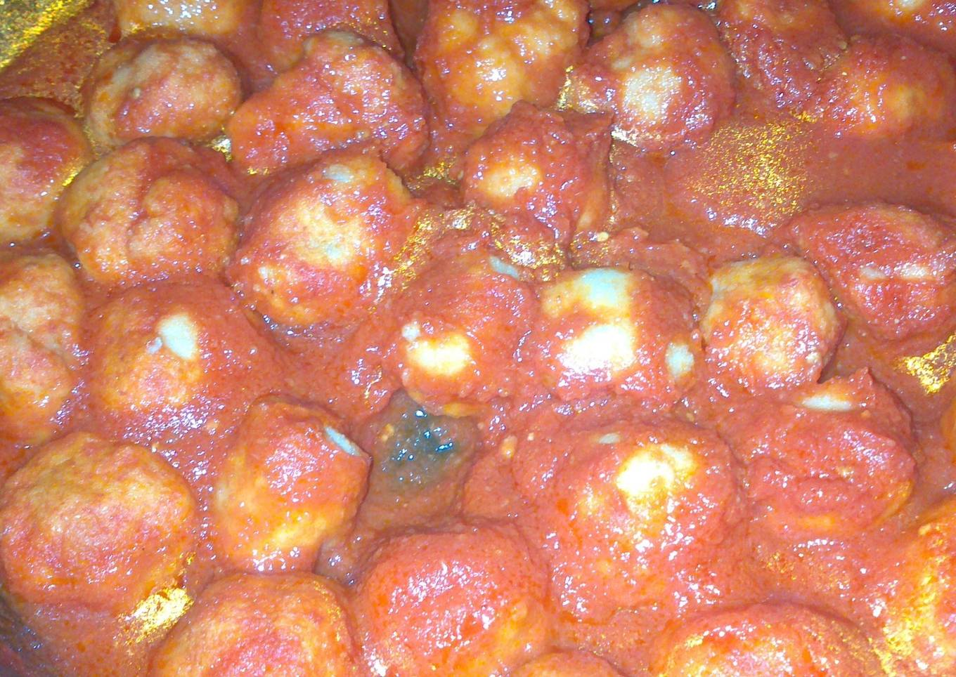 Albóndigas de carne de jamón de cerdo en tomate casero
