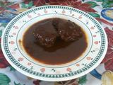 Lomo de cerdo en chile mulato y uva pasas