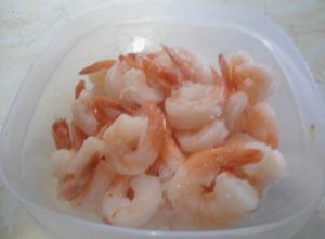 Una foto de Camarones en salsa de queso
