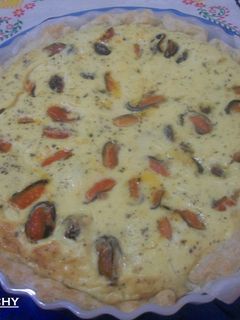 Una foto de Quiche de mejillones con tomates Cherry macerados