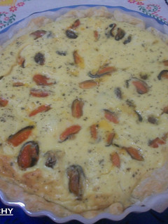Una foto de Quiche de mejillones con tomates Cherry macerados