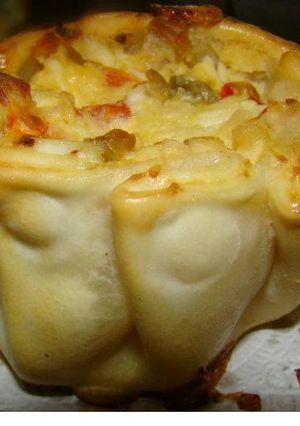 Una foto de Cestitas sabor pizza de jamón y queso