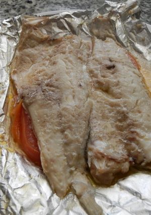 Una foto de Lubina en papillote con verduras