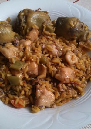 Una foto de Arroz con calamarcito y verduras