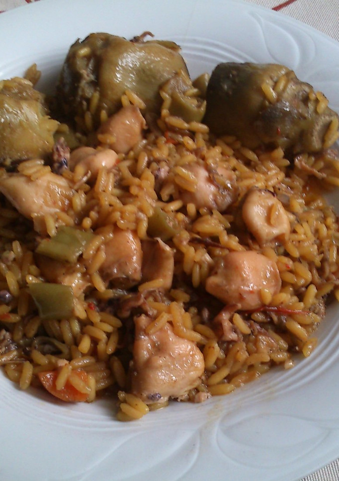 Una foto de Arroz con calamarcito y verduras