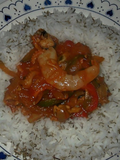 Una foto de Arroz con salsa de mariscos