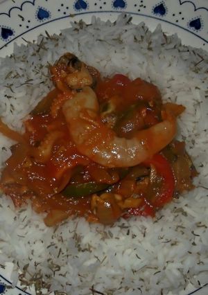 Una foto de Arroz con salsa de mariscos