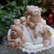 Cupcake de osos amorosos con biberones en fondant