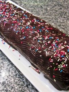 Una foto de Brazo de gitano relleno de trufa y chocolate