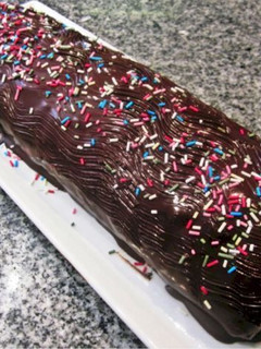 Una foto de Brazo de gitano relleno de trufa y chocolate