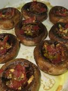 Una foto de Champiñones al horno con ajo y perejil