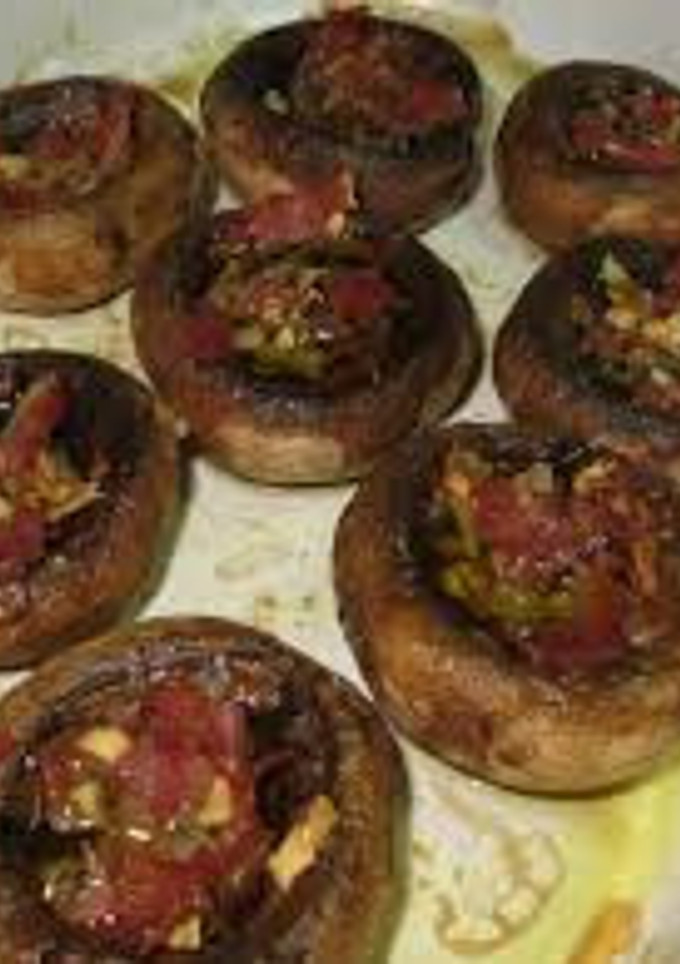 Una foto de Champiñones al horno con ajo y perejil