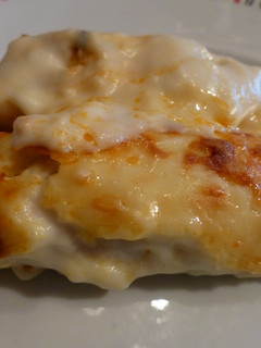 Una foto de Canelones de pollo, tomate y bechamel