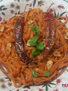 Una foto de Tagliolinis picantes al ajo
