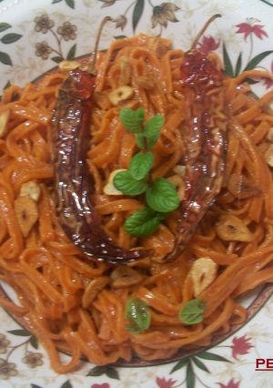 Una foto de Tagliolinis picantes al ajo