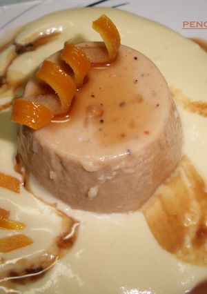 Una foto de Mousse de turrón con salsa de naranja al Mascarpone