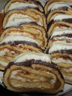 Una foto de Arrolladitos de dulce de leche y crema de queso