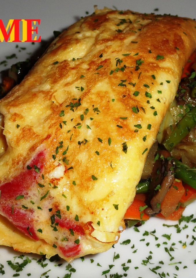 Una foto de Tortilla de queso de cabra y pimiento del piquillo