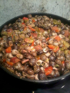 Una foto de Caracoles con verduras
