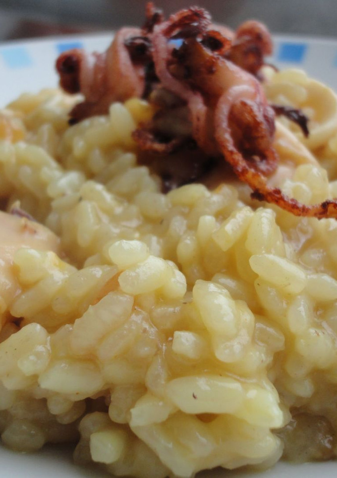 Una foto de Arroz meloso de calamares