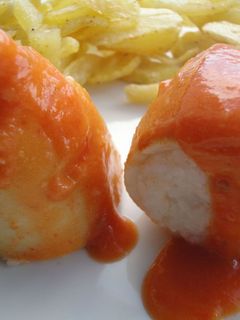 Una foto de Calamares rellenos de arroz con gambas