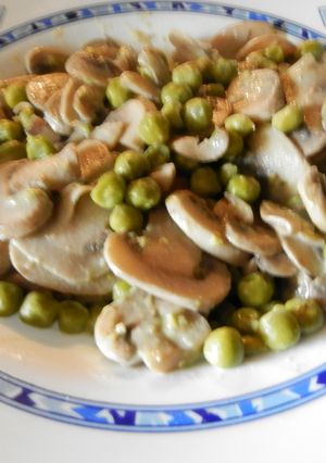 Una foto de Guisantes con champiñones