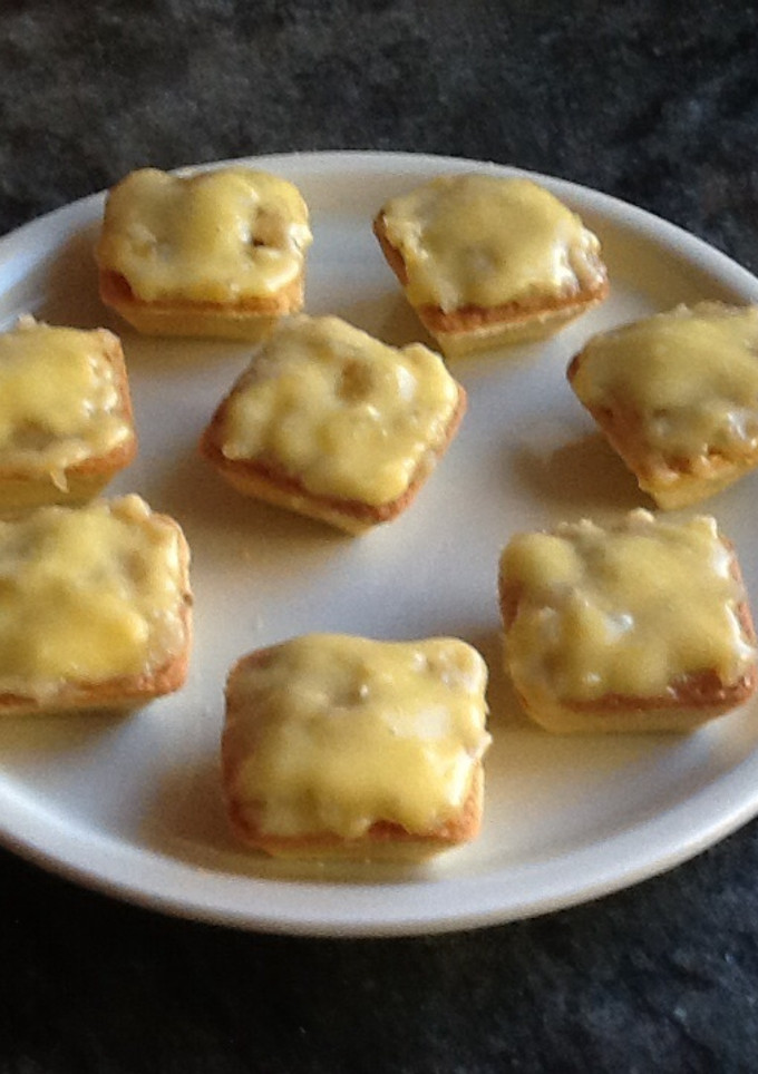 Una foto de Tartaletas de patata, cebolla y ajoaceite