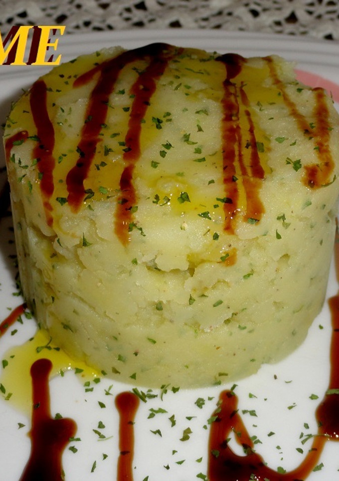 Una foto de Timbal de puré de patatas al aceite balsámico