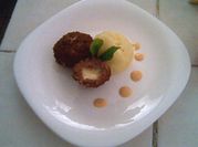 Una foto de guiso de gallina en leche