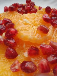 Una foto de Naranjas con granada