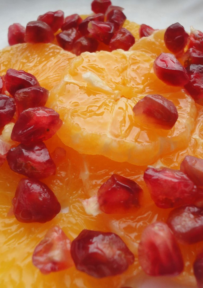 Una foto de Naranjas con granada