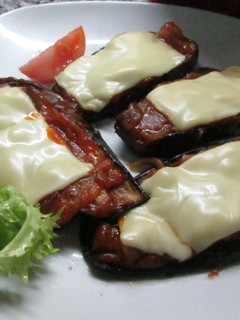 Una foto de Pizzetas de berenjenas con champiñones