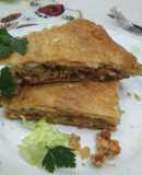Tarta de hojaldre con verduras y chopped de pork