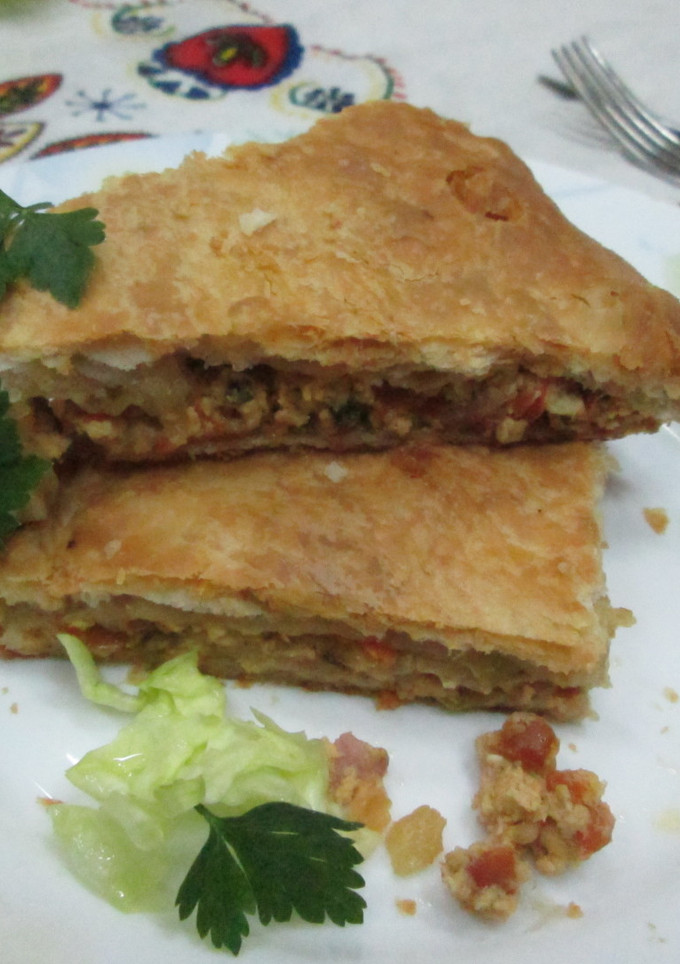 Una foto de Tarta de hojaldre con verduras y chopped de pork