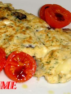 Una foto de Tortilla de champiñones y queso brie