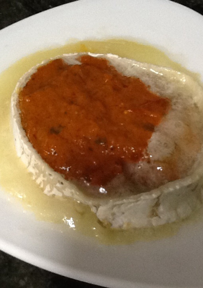 Una foto de Queso de cabra templado con tikka masala