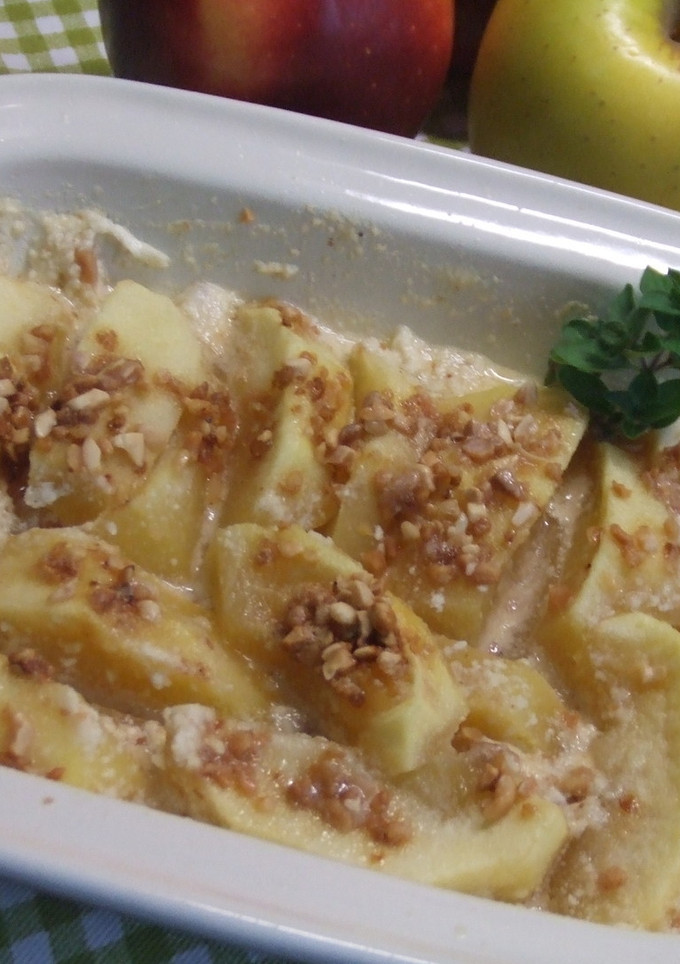 Una foto de Manzanas al horno con almendra crocanti y aguardiente