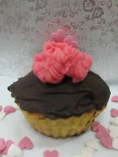 Una foto de Cupcake con chocolate y crema de mantequilla
