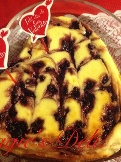 Una foto de Cheesecake brownie y moras