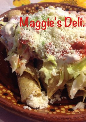Una foto de Flautas de carne deshebrada