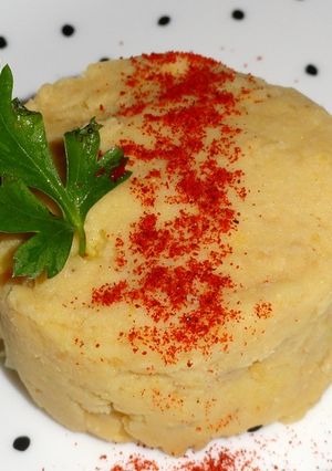 Una foto de Timbal de humus