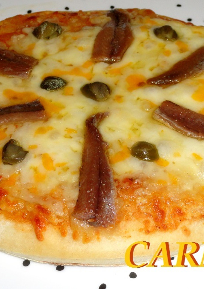 Una foto de Pizzeta de quesos y anchoas