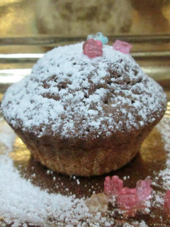 Una foto de Muffin de chocolate con azúcar glas